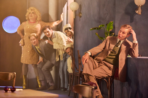 Richard Cant as Malvolio observed by others including Michael Matus (as Toby) and Matthew Spencer (as Andrew Aguecheek)